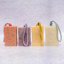 Load image into Gallery viewer, Group shot of Soap on a Rope bars in different fragrances: Coast, Mountain, Garden, Grove, all vegan and handmade