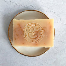 Load image into Gallery viewer, Hand thrown white Porcelain soap dish with gold lustre rim and grove citrus and calendula bar soap
